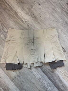 Dolls Kill Neutral Beige Pleated Skort with Dark Inner Shorts
